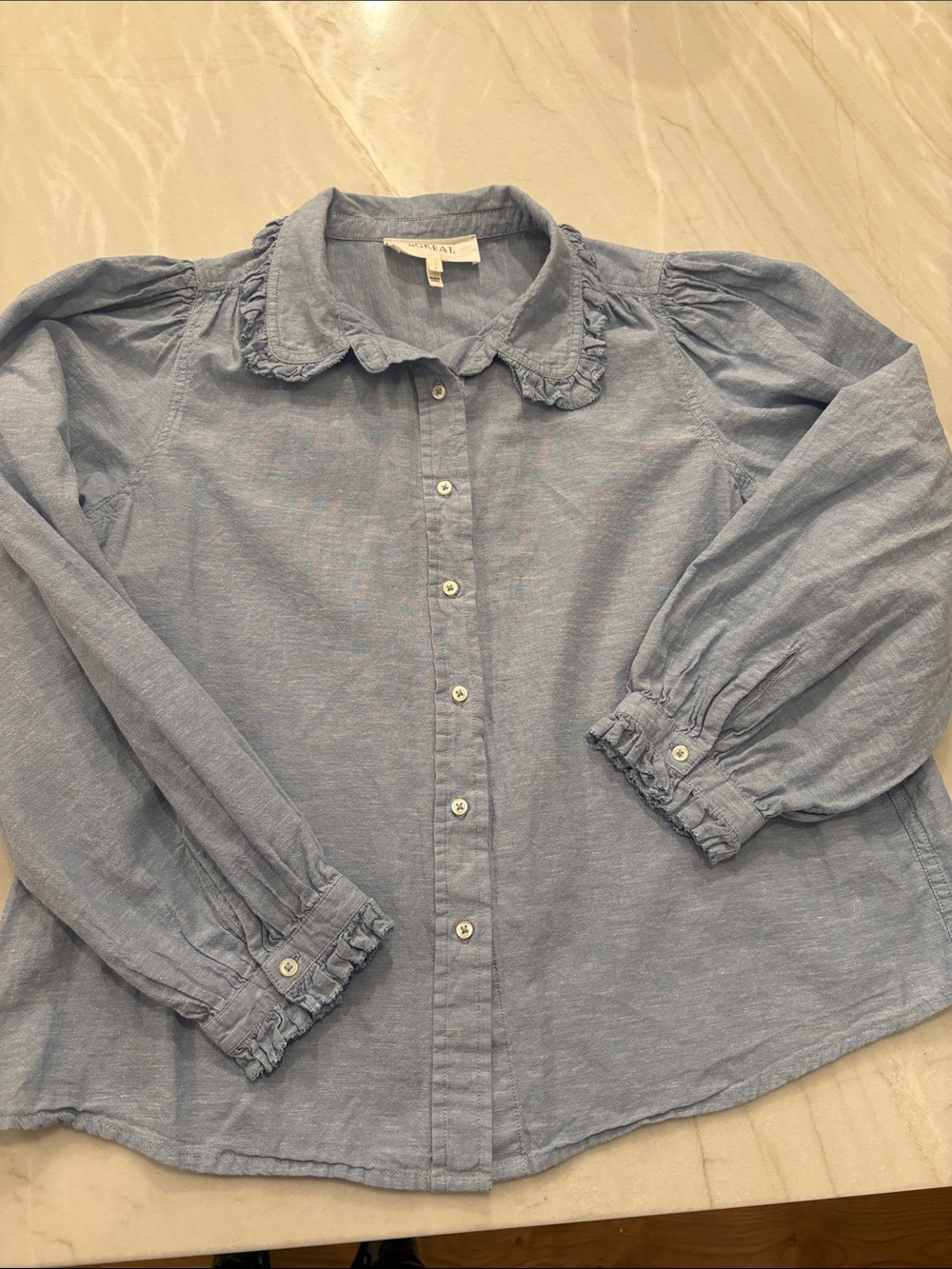 THE GREAT- The Hemingway Too- Light Blue Ruffle Collar Button-Down Shirt
